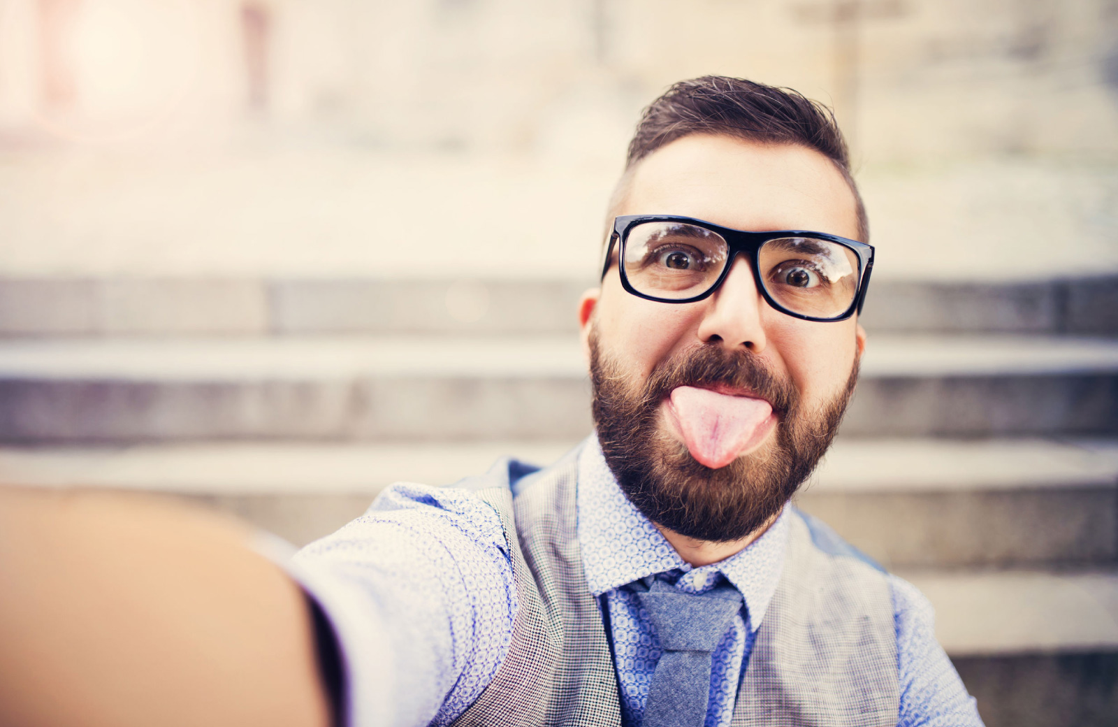 man with glasses and beard taking a selfie altana glendale
