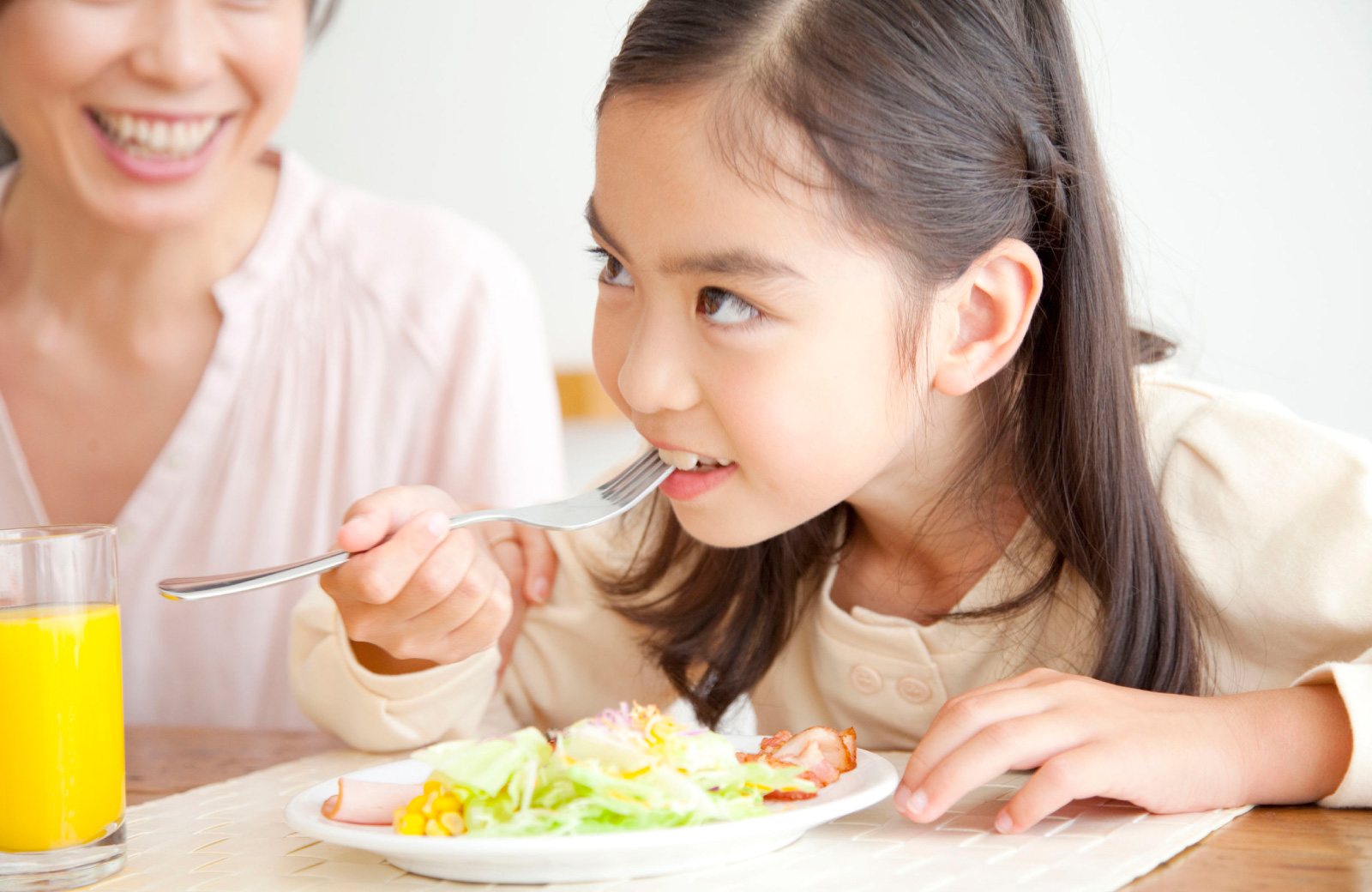 girl eating healthy food - madrid apartments los angeles