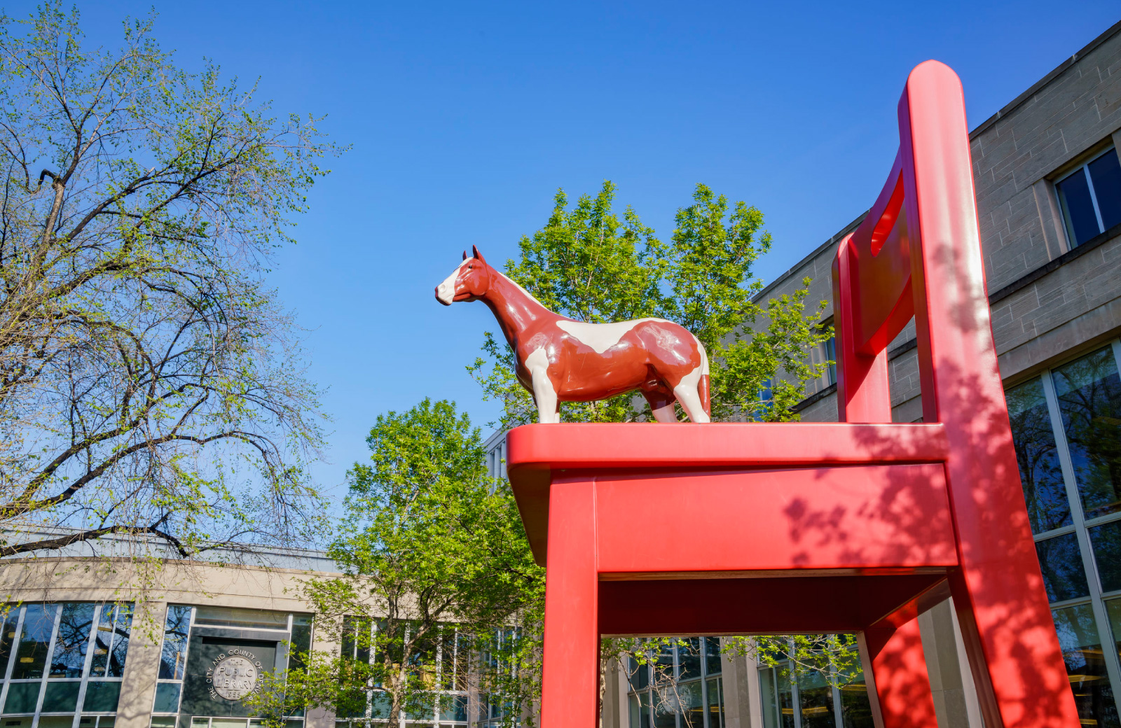 big red chair with horse colab