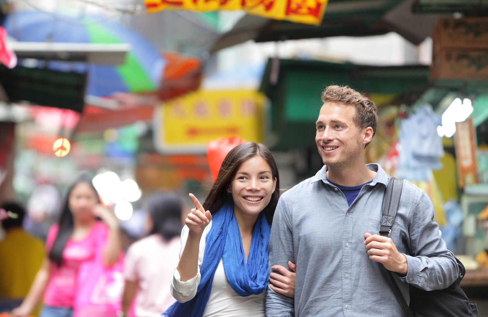 couple strolling in chinatown