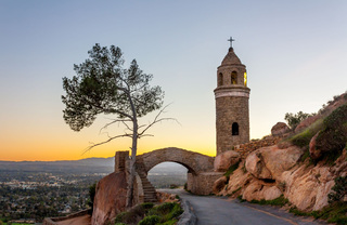 The Testimonial Peace Tower and Bridge at Mount Rubidoux Park at sunset