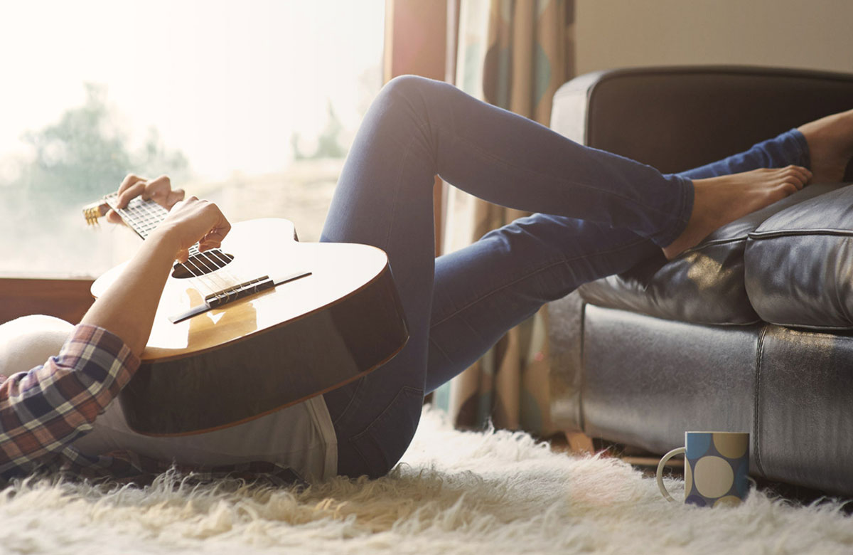Altana - Laying on floor playing guitar