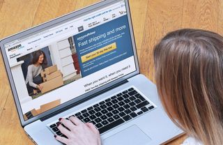 Woman shopping on her laptop