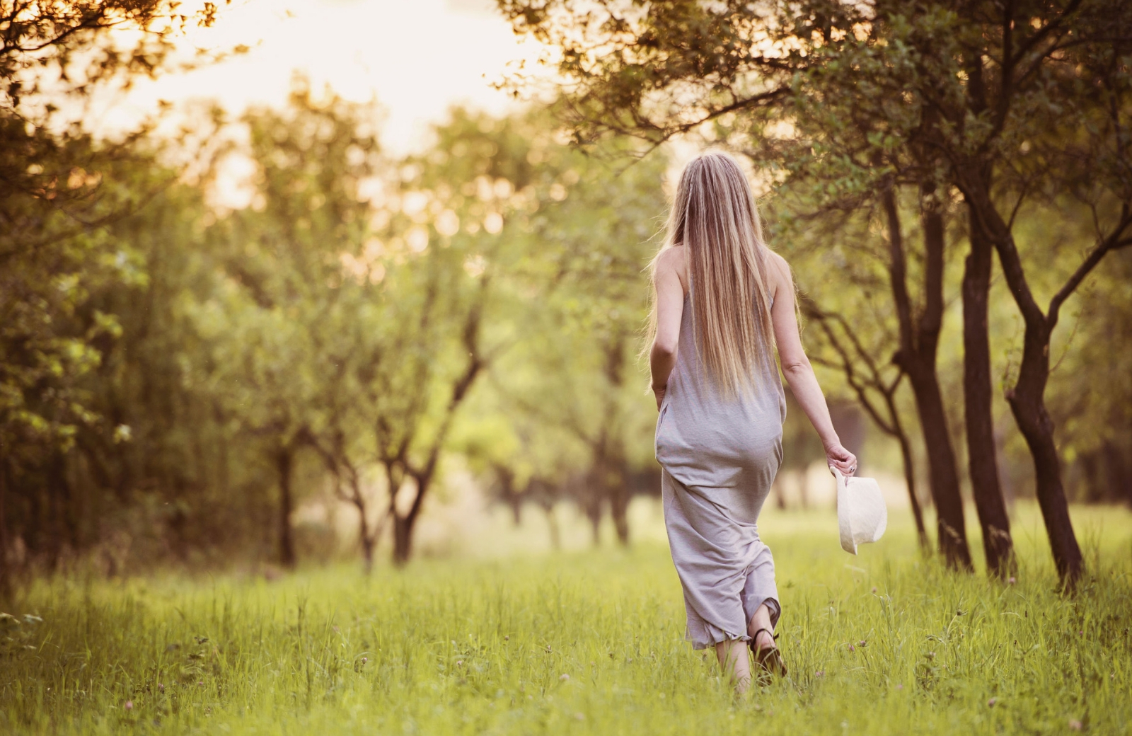 woman walking in nature park
