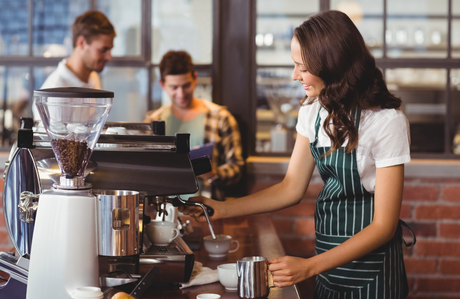 barista making coffee