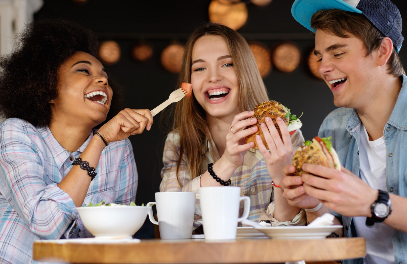friends enjoying burgers