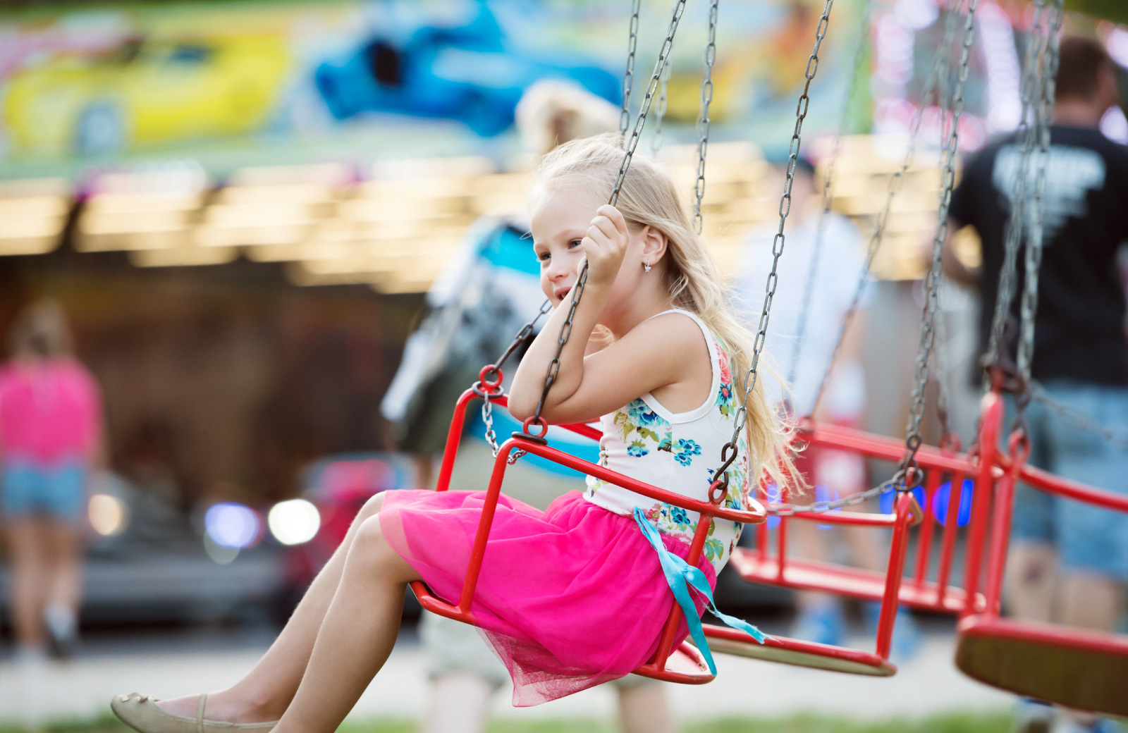 little girl on a swing