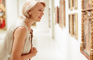 woman looking at art