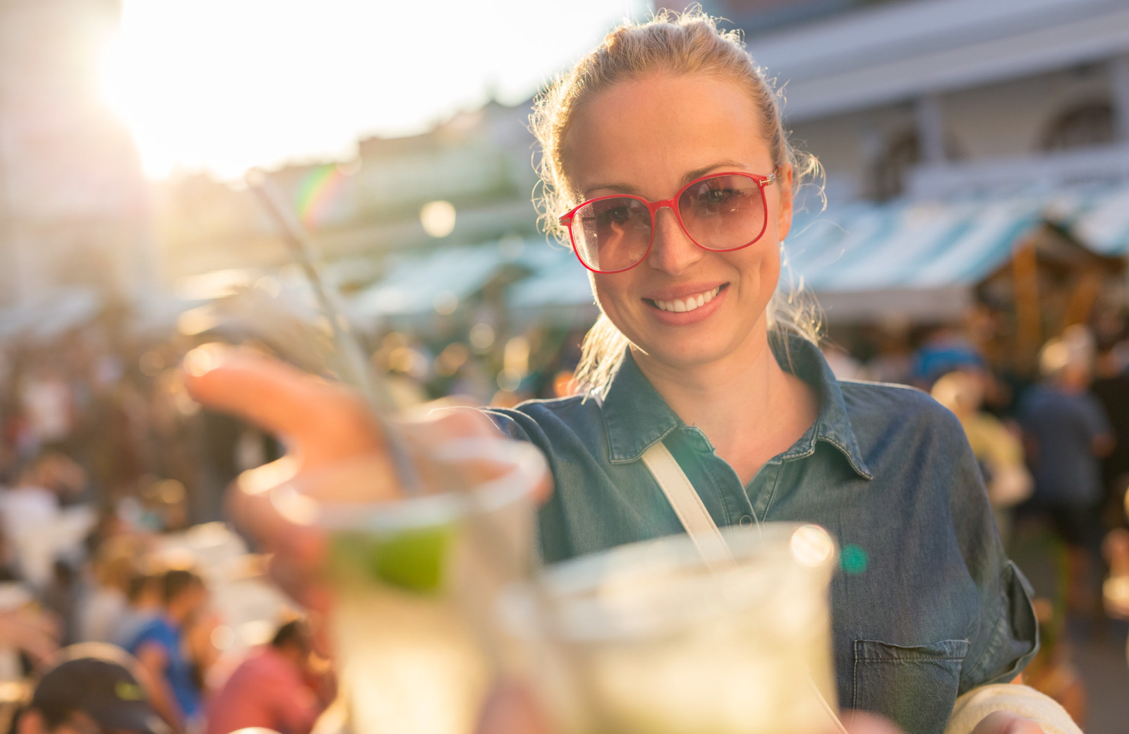 woman offering a drink