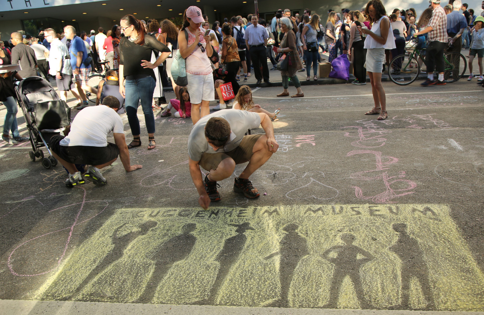 people creating street art for festival