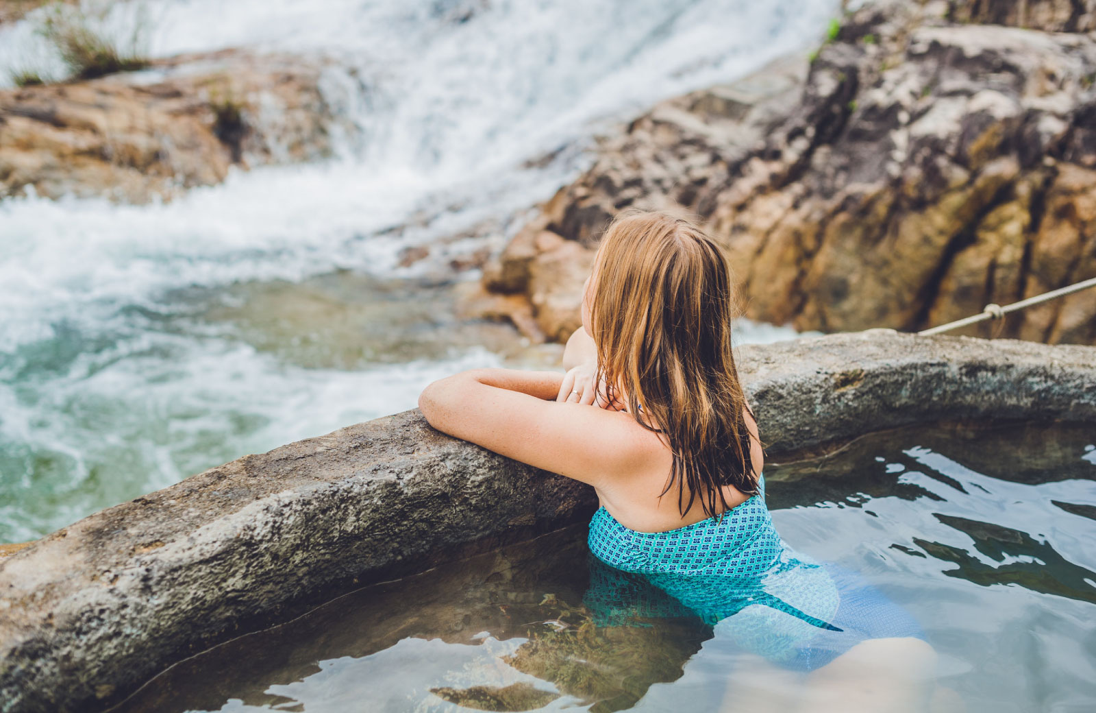 woman enjoying hotspring