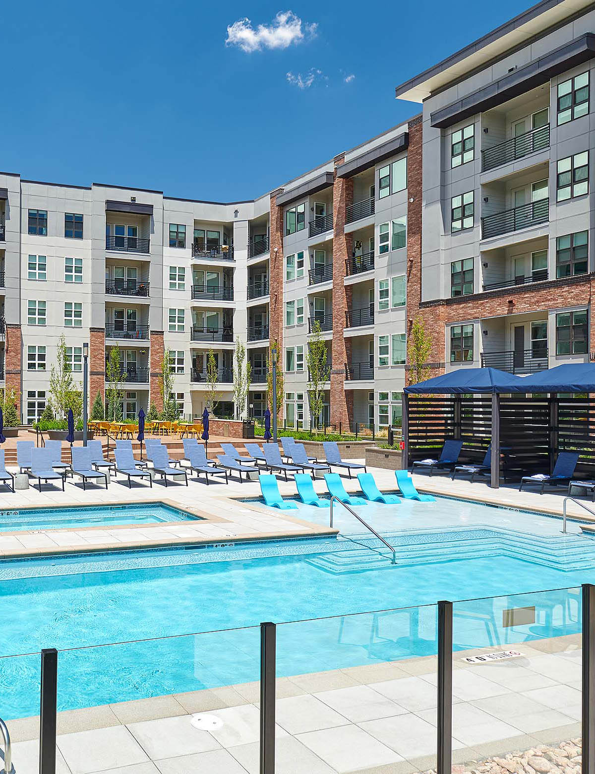 close up of large courtyard swimming pool - The Henry luxury apt building amenities