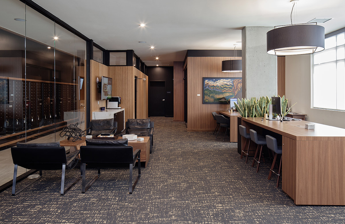 large community room with ample seating and lounge area - The Henry luxury apt building amenities