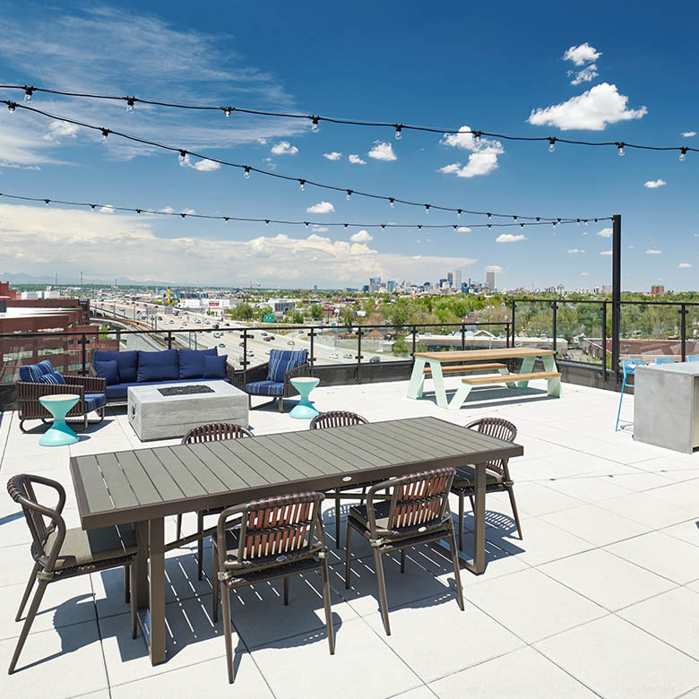 large community room with ample seating and lounge area - The Henry luxury apt building amenities