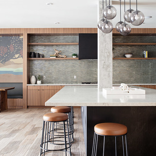 large community table and kitchen area for residents - The Henry luxury apt building amenities