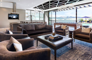 Conversation seating and a billiard table in the rooftop lounge