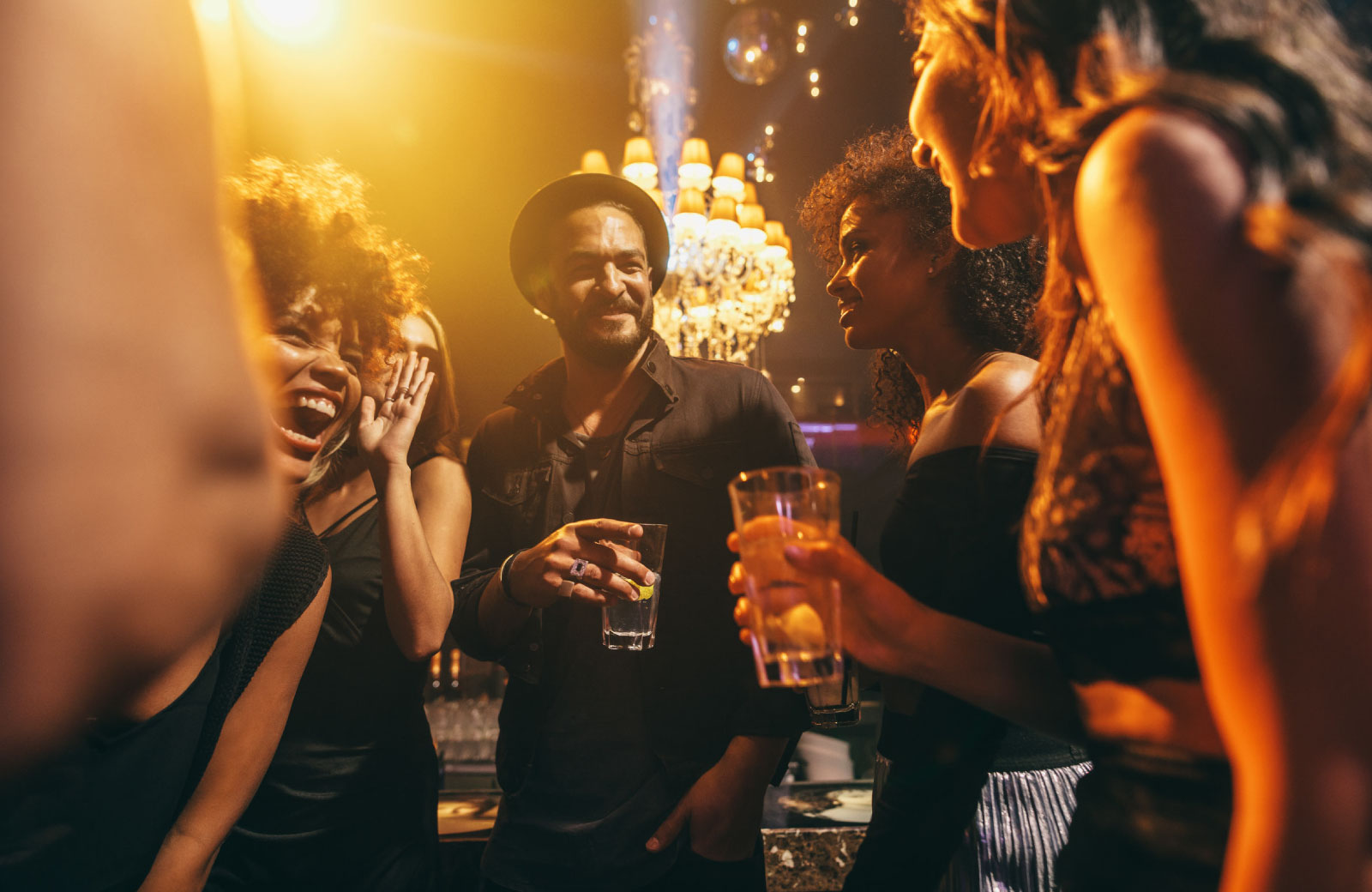 group of friends having fun in bar