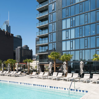 Pool and lounge chairs on the Atelier Pool Deck & Terrace