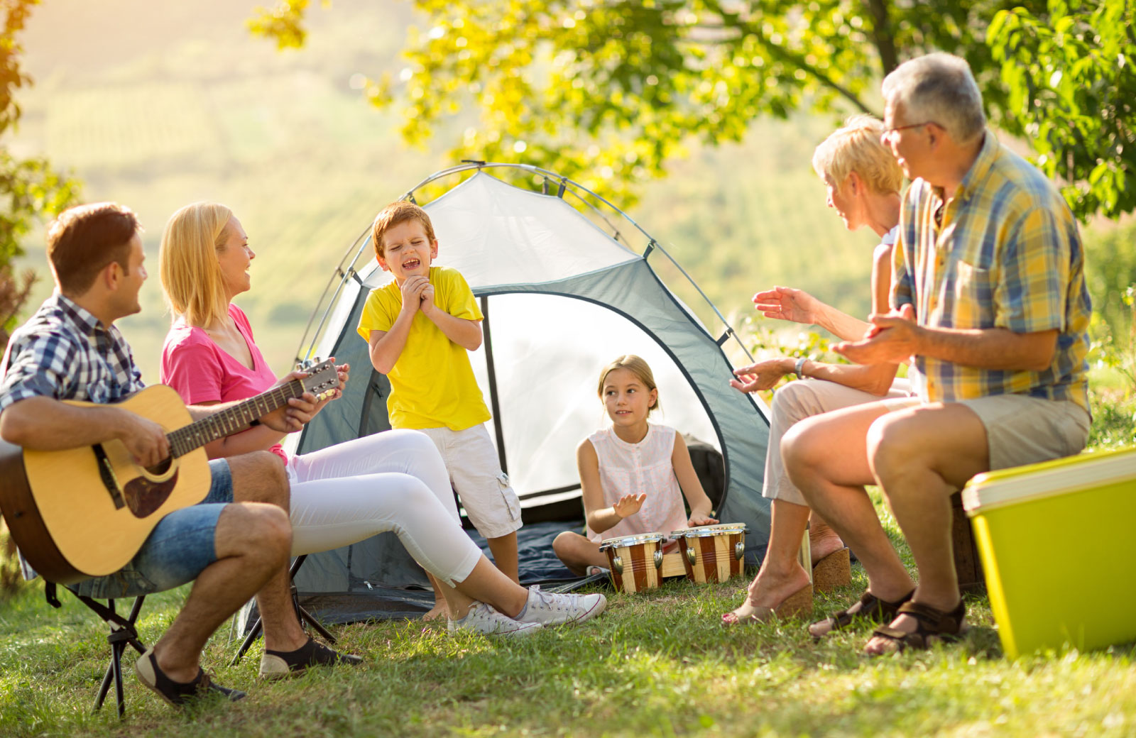 family in campgrounds with tent