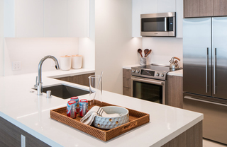 Atelier Apartment kitchen with stainless steel appliances